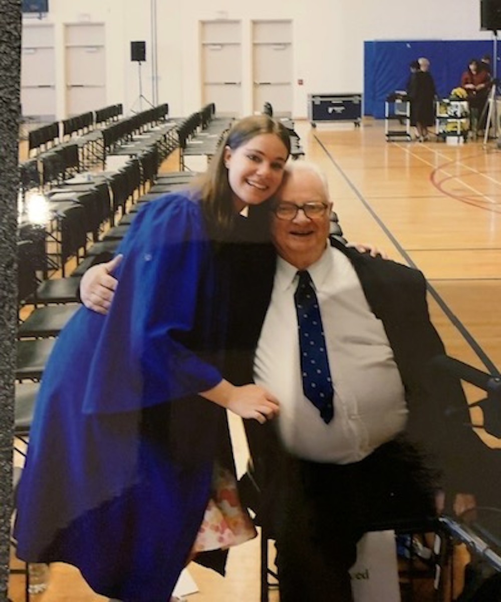 Amanda Giles at her TFS graduation with her grandfather, Harry