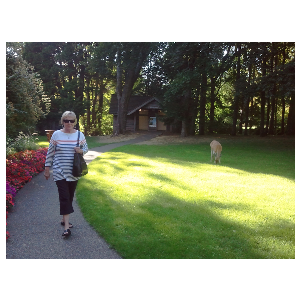 Susan playing with the deer at Filberg Lodge on Vancouver Island. 