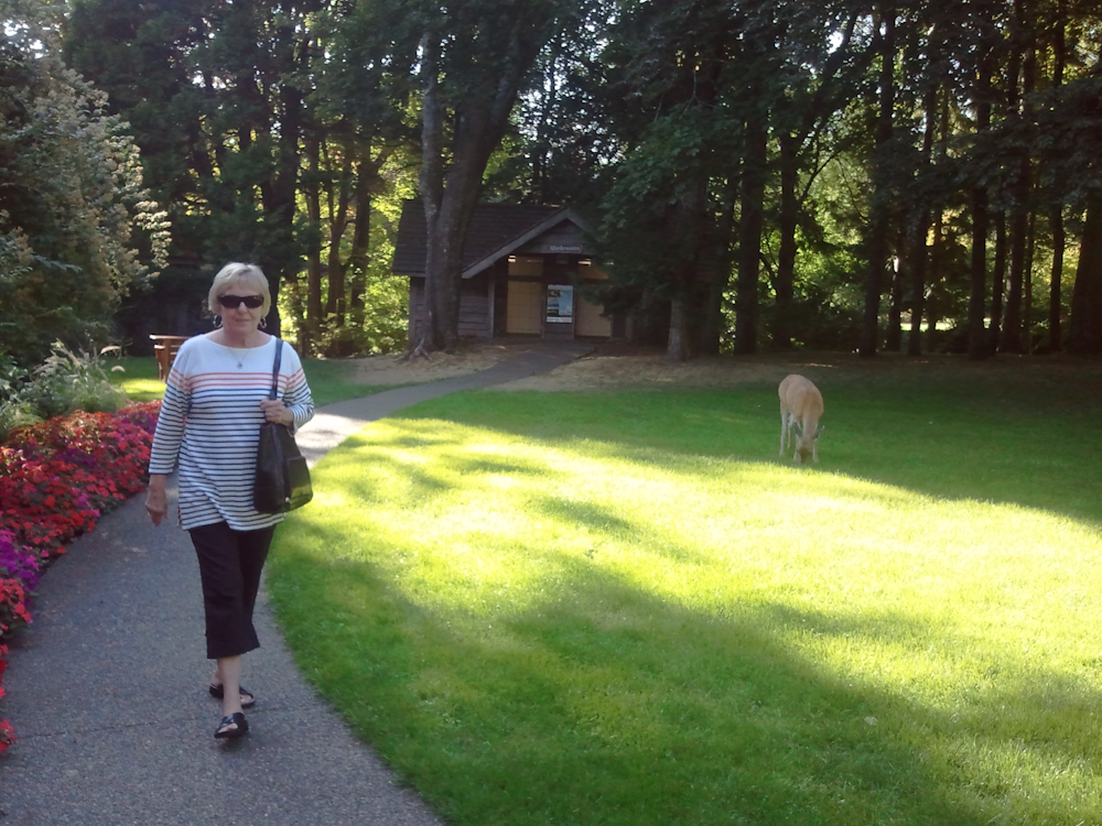 Susan playing with the deer at Filberg Lodge on Vancouver Island. 