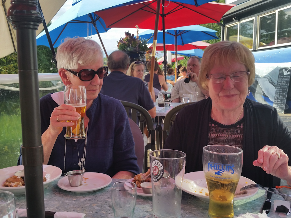 Susan and Dawnie enjoying a beer and some quality patio time. Looks like that glass of ice is empty!