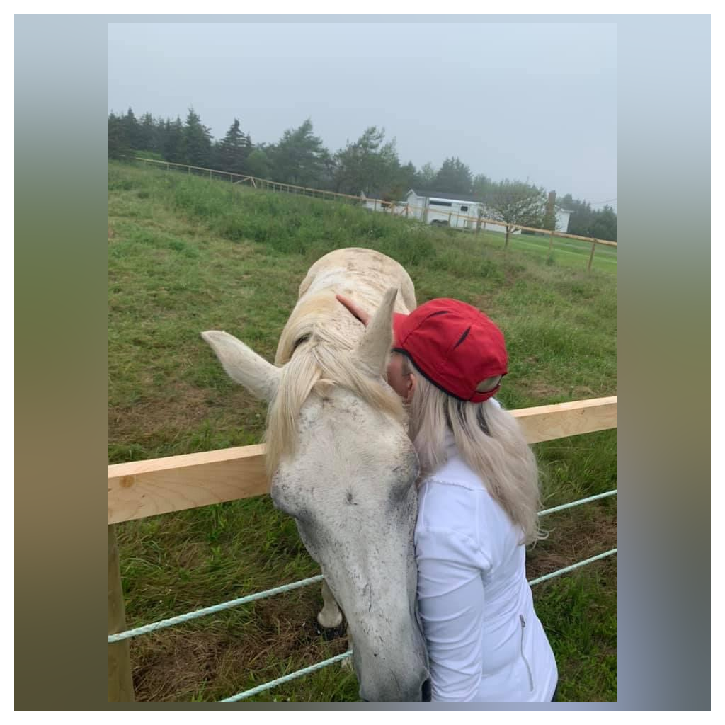Yvette in Cape Breton bonding with the horses. All animals loved Yvette, and Yvette loved all animals. They could feel her warmth and love. 💕💋🎀